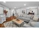 Spacious living room with hardwood floors, modern decor, and an open layout at 2224 Boston Ct # A, Indianapolis, IN 46228