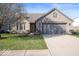 Brick ranch home with attached garage and landscaped lawn at 2322 Bainbridge Rd, Greenwood, IN 46143