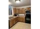 Well-equipped kitchen with oak cabinets and modern appliances at 2322 Bainbridge Rd, Greenwood, IN 46143