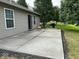 Spacious concrete patio perfect for outdoor grilling and relaxing at 2322 Bainbridge Rd, Greenwood, IN 46143