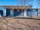 House exterior showcasing a covered patio and backyard at 2814 S Randolph St, Indianapolis, IN 46203