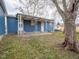 This backyard is fenced and has a covered porch area at 2814 S Randolph St, Indianapolis, IN 46203