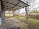 This backyard features a covered patio area at 2814 S Randolph St, Indianapolis, IN 46203
