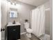 This bathroom features a modern vanity and a shower/tub combo at 2814 S Randolph St, Indianapolis, IN 46203
