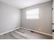 Neutral bedroom with a window and vinyl flooring at 2814 S Randolph St, Indianapolis, IN 46203