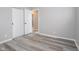 Bedroom showcasing a large closet with modern paint and vinyl flooring at 2814 S Randolph St, Indianapolis, IN 46203