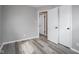 Bedroom showcasing neutral paint and flooring with closet and doorway at 2814 S Randolph St, Indianapolis, IN 46203
