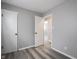 This bedroom has neutral paint and modern hard surface floors at 2814 S Randolph St, Indianapolis, IN 46203