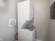 Convenient laundry area with a modern, stacked washer and dryer at 2814 S Randolph St, Indianapolis, IN 46203