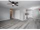 Open concept living room featuring modern gray flooring that flows into kitchen at 2814 S Randolph St, Indianapolis, IN 46203