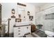 Charming bathroom featuring a stylish vanity with a vessel sink and a glass-enclosed shower with seat at 301 Lowry St, Jamestown, IN 46147