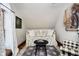Comfortable bedroom space with natural light, neutral paint, and decor at 301 Lowry St, Jamestown, IN 46147