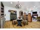 Open dining room showcasing hardwood floors, decorative accents, and an antique table set at 301 Lowry St, Jamestown, IN 46147