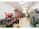 Organized garage with skylights, ample storage, and workbench area at 301 Lowry St, Jamestown, IN 46147