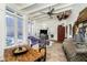 Inviting sunroom featuring natural light, casual seating, and vintage decor at 301 Lowry St, Jamestown, IN 46147