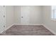Well-lit bedroom with neutral walls and wood-look flooring at 317 N Belleview Pl, Indianapolis, IN 46222