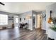 Bright living area with wood floors, a desk, and plenty of natural light at 3174 Hemlock St, Whiteland, IN 46184