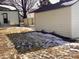 Side yard view of detached garage and fence at 3608 N Chester Ave, Indianapolis, IN 46218