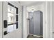 Entryway featuring a windowed door and a mudroom with storage hooks and cabinets at 5210 E Pleasant Run Parkway North Dr, Indianapolis, IN 46219