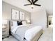 Spacious bedroom featuring a king-size bed and access to a hallway at 5326 Noble Crossing W Pkwy, Noblesville, IN 46062