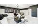 Game room with foosball table and sectional sofa at 5326 Noble Crossing W Pkwy, Noblesville, IN 46062
