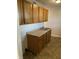 Efficient kitchen with ample wood cabinetry and a double sink at 5778 E 30Th St, Indianapolis, IN 46218