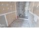 Bathroom with marble tile shower surround at 605 Hendricks St, Anderson, IN 46016