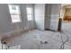 New bedroom under construction, walls and floors unfinished at 605 Hendricks St, Anderson, IN 46016