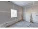 Unfinished bedroom with drywall and a window at 605 Hendricks St, Anderson, IN 46016