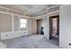 New bedroom under construction, walls and floors unfinished at 605 Hendricks St, Anderson, IN 46016