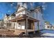 Two-story home with large front porch and mature tree. Needs renovation at 605 Hendricks St, Anderson, IN 46016