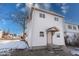 Two-story white house with front steps and small yard at 605 Hendricks St, Anderson, IN 46016