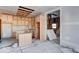 Under construction, kitchen with unfinished wood cabinets at 605 Hendricks St, Anderson, IN 46016