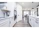 Modern kitchen with white cabinets and stainless steel appliances at 7419 Legends Way, Whitestown, IN 46052