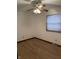 Bright bedroom with ceiling fan and laminate wood floor at 7440 Hearthstone Way, Indianapolis, IN 46227