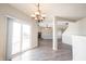 Open dining area, with a view of living room and fireplace at 9286 W Quarter Moon Dr, Pendleton, IN 46064