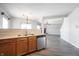 Modern kitchen with stainless steel appliances and light wood cabinets at 9286 W Quarter Moon Dr, Pendleton, IN 46064