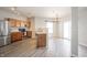 Open concept kitchen and dining area with stainless steel appliances and light wood cabinets at 9286 W Quarter Moon Dr, Pendleton, IN 46064