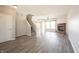 Spacious living room with fireplace and vinyl flooring at 9286 W Quarter Moon Dr, Pendleton, IN 46064