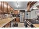 Well-equipped kitchen with granite countertops and stainless steel appliances at 9649 Highgate N Cir, Indianapolis, IN 46250