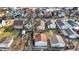 Aerial view of a residential street with multiple cozy homes and backyard garages at 1028 Albany St, Indianapolis, IN 46203