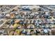 Wide aerial view of a neighborhood with many houses and a commercial zone in the distance at 1028 Albany St, Indianapolis, IN 46203