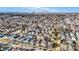Expansive aerial view of a residential area with a cityscape in the distance under a bright sky at 1028 Albany St, Indianapolis, IN 46203
