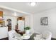 Dining area adjacent to kitchen features modern table and chairs at 1028 Albany St, Indianapolis, IN 46203