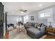 Inviting living room boasting hardwood floors, natural light, and stylish decor at 1028 Albany St, Indianapolis, IN 46203