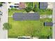 Aerial view of a well-maintained lawn with a single Gathering home and detached garage at 1175 Central Ave, Noblesville, IN 46060