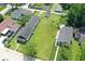 Aerial view of a single Gathering home with lush lawn and detached garage at 1175 Central Ave, Noblesville, IN 46060