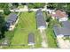 Expansive yard space with mature trees, detached garage, and surrounding neighborhood views at 1175 Central Ave, Noblesville, IN 46060