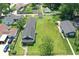 A birds-eye view of a home with a large, well-maintained lawn and surrounding neighborhood at 1175 Central Ave, Noblesville, IN 46060