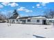 House backyard with snow covered ground at 1175 Central Ave, Noblesville, IN 46060